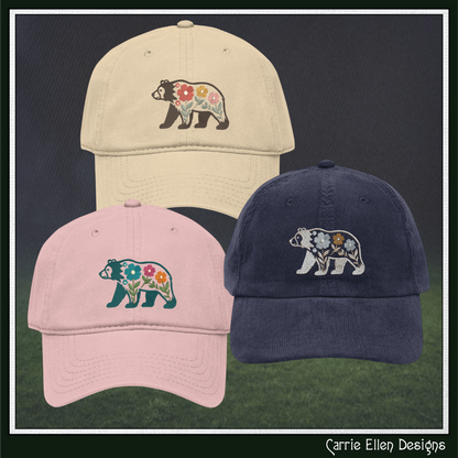 Baseball caps with bear designs on a dark background, featuring 'Carrie Ellen Designs'.