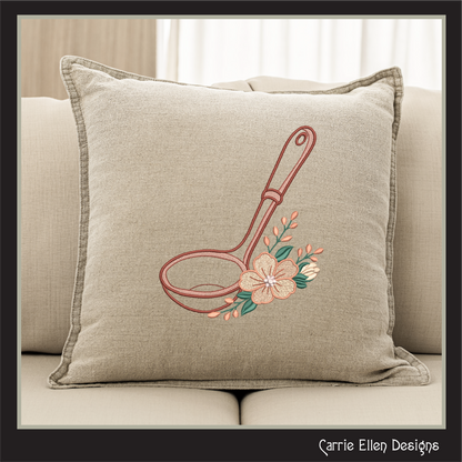 Beige pillow with Floral Kitchen Ladle Machine Embroidery Design featuring a classic soup ladle accented with soft, elegant floral details.
