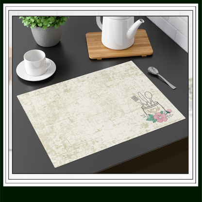 Placemat with Floral kitchen silverware utensil jar embroidery design featuring spoon fork knife holder with flowers on a table with a teapot and cup.
